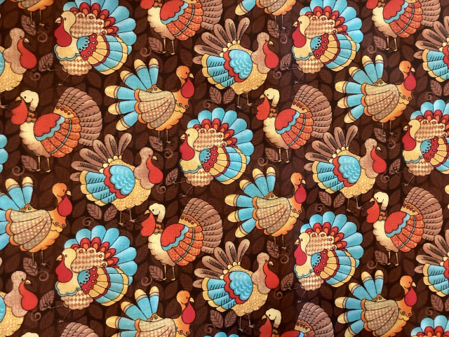 Bright turkeys with aqua/orange/beige feathers on chocolate brown background