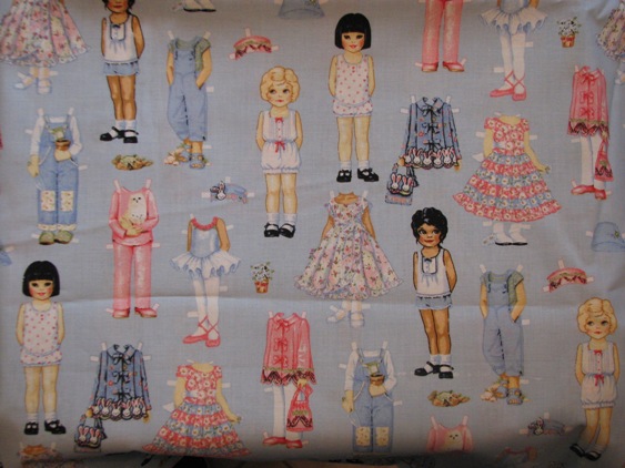 Paper Dolls on light blue in different outfits