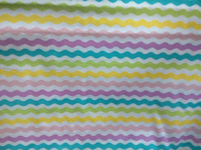 Wavy rick rack stripes of lime/aqua/lavender/peach/yellow on white