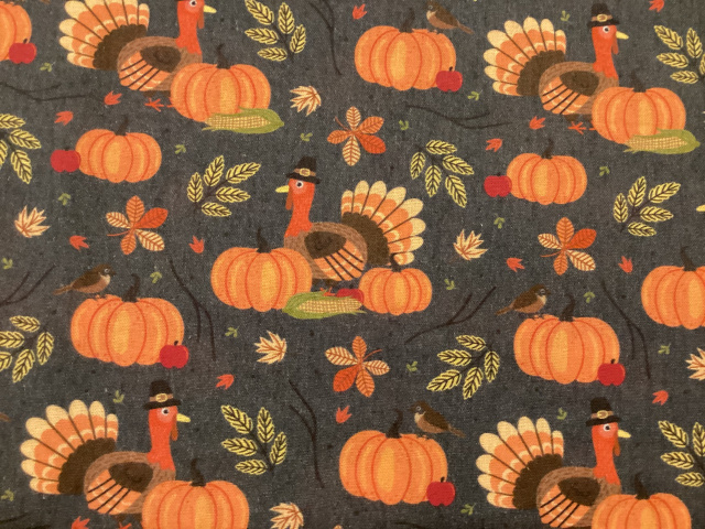 Turkeys, pumpkins, and leaves on gray