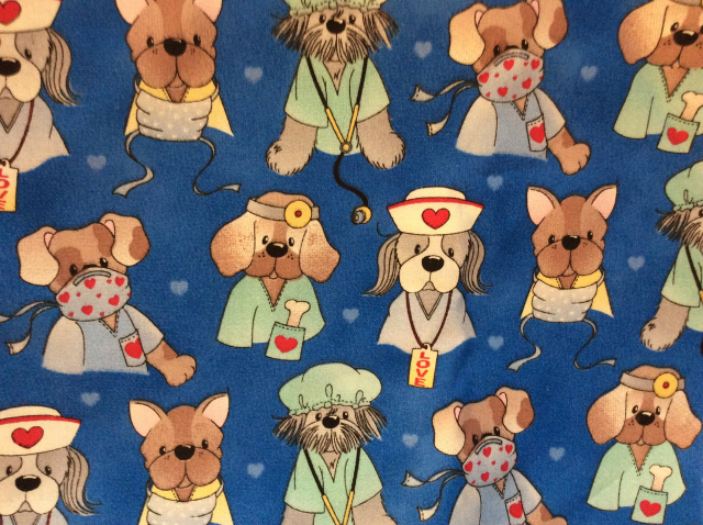 Dogs of many breeds in scrubs and masks 