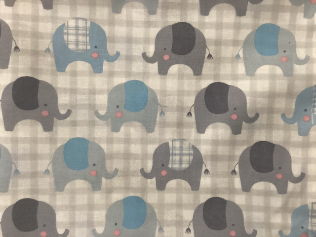 Gray and blue elephants on gray and white plaid