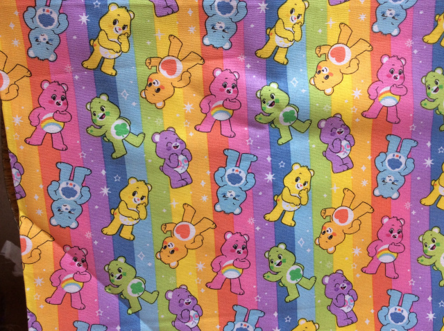 Rainbow stripes with bright scattered  bears 