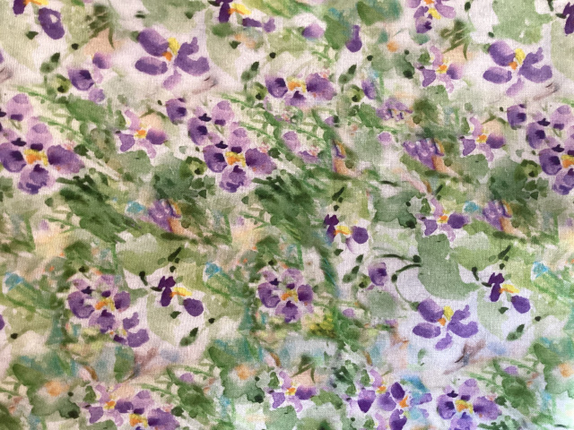 Lavender flowers and green foliage done in a watercolor style 