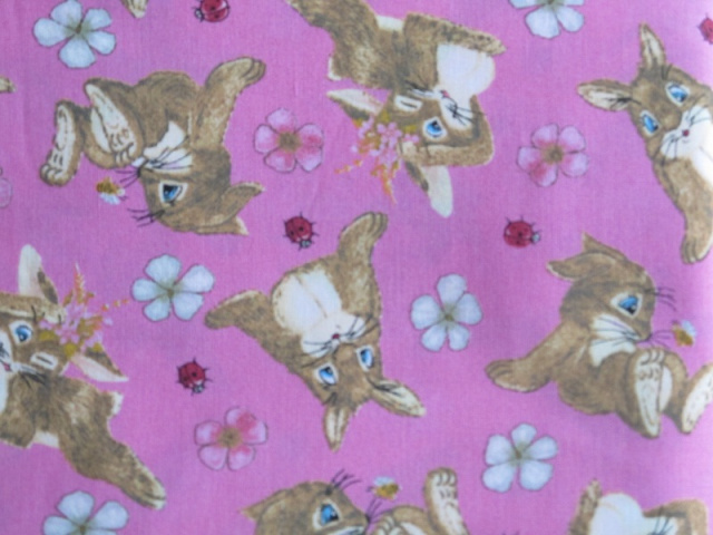 Bunnies & Flowers on pink - 8" round