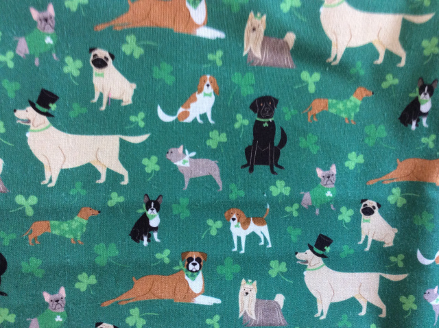 Boxer, black lab, golden, beagle, pug, French bulldog, York is, dachshund, on green with shamrocks