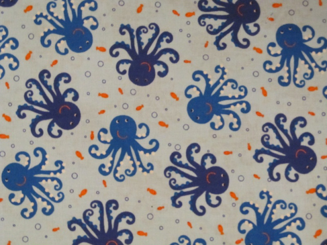 Bright blue Octopus and Goldfish on cream - 8" round