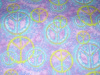 Aqua and lime peace Signs on lavender  - 8" round