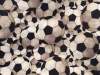 Large black/white soccer balls in this fabric where the print is also the background 