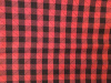 Black/red buffalo plaid with diagonal black stitches